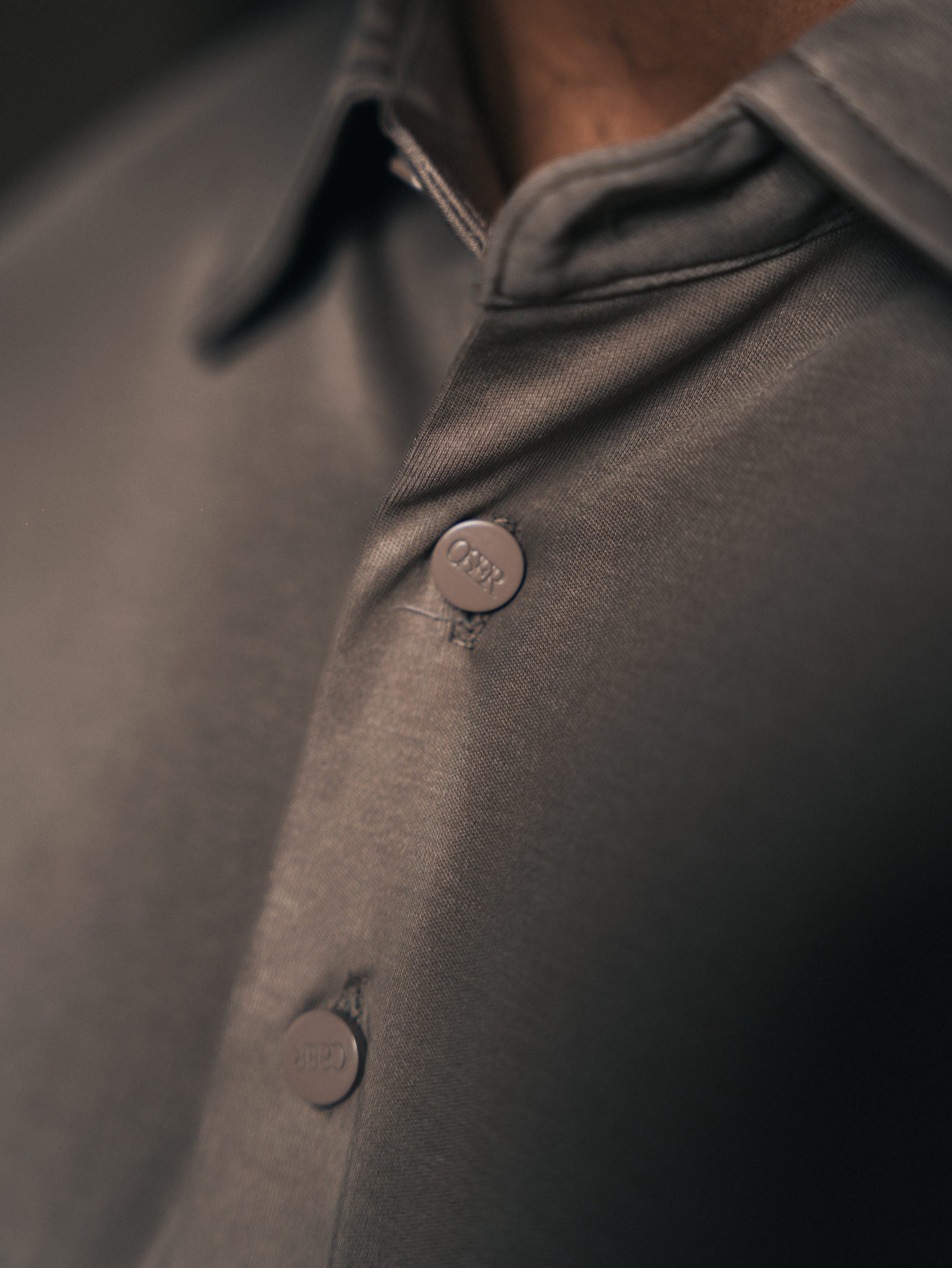 Glans polo met lange mouwen