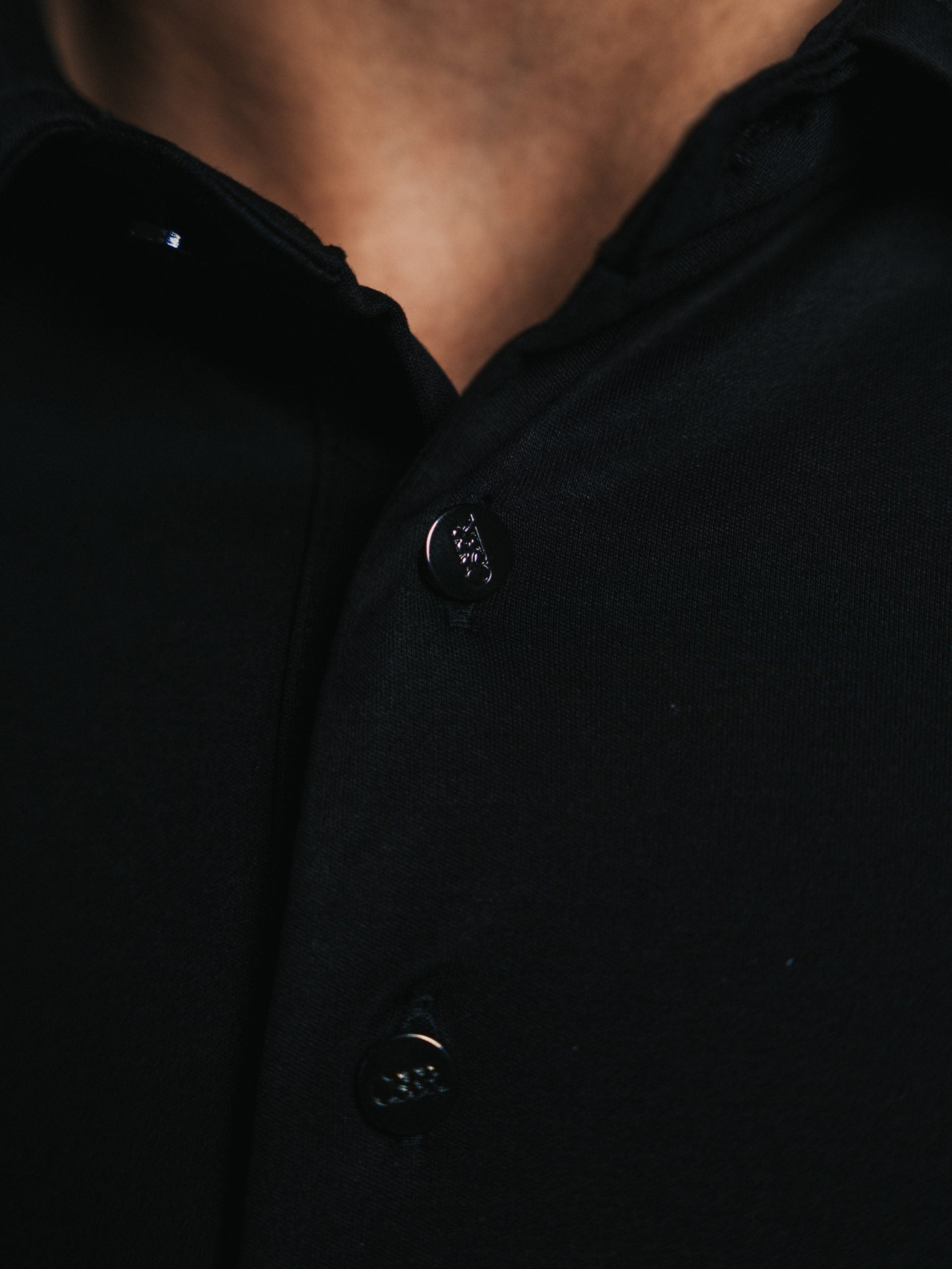 Glans polo met lange mouwen