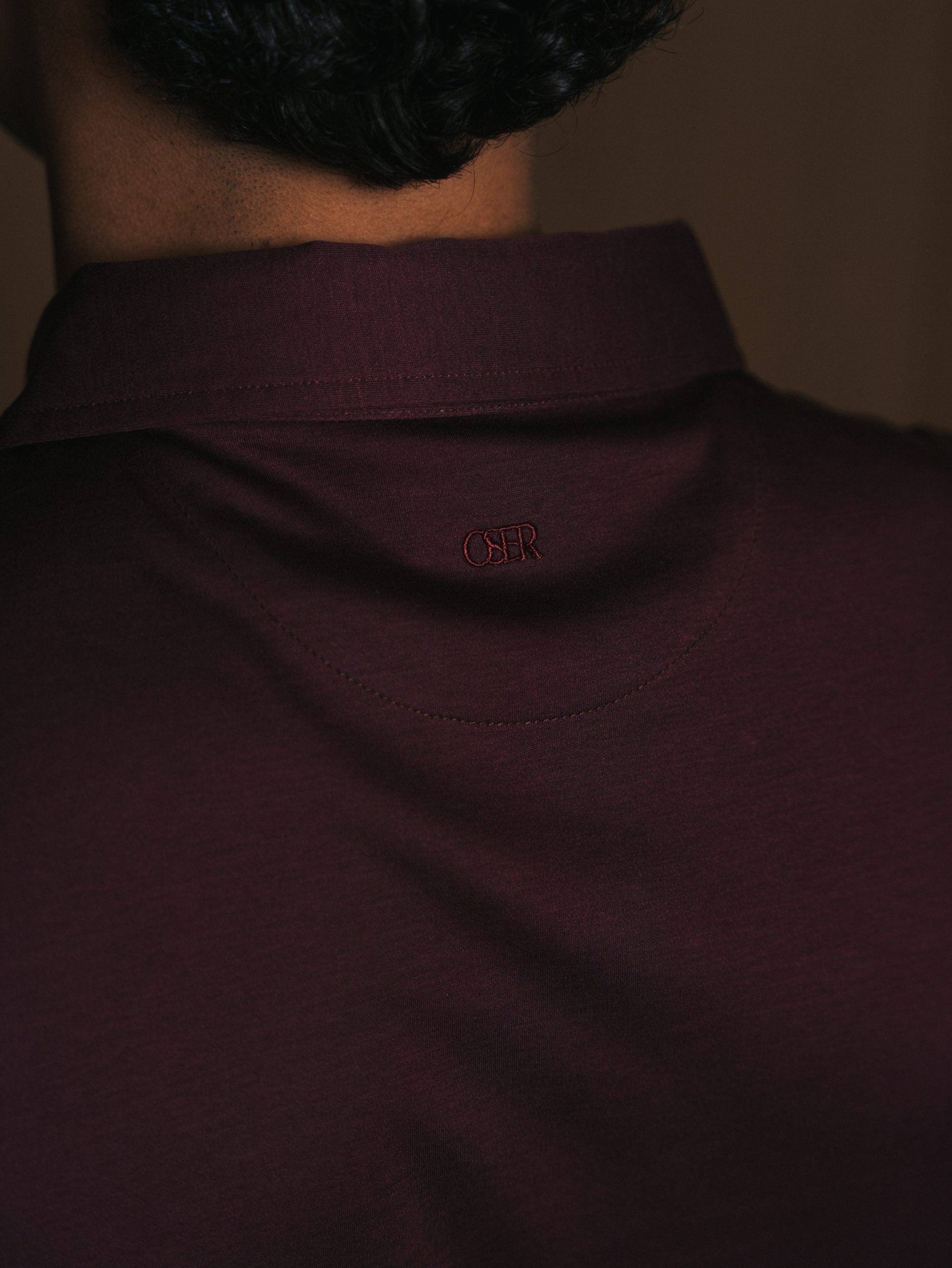 Glans polo met lange mouwen