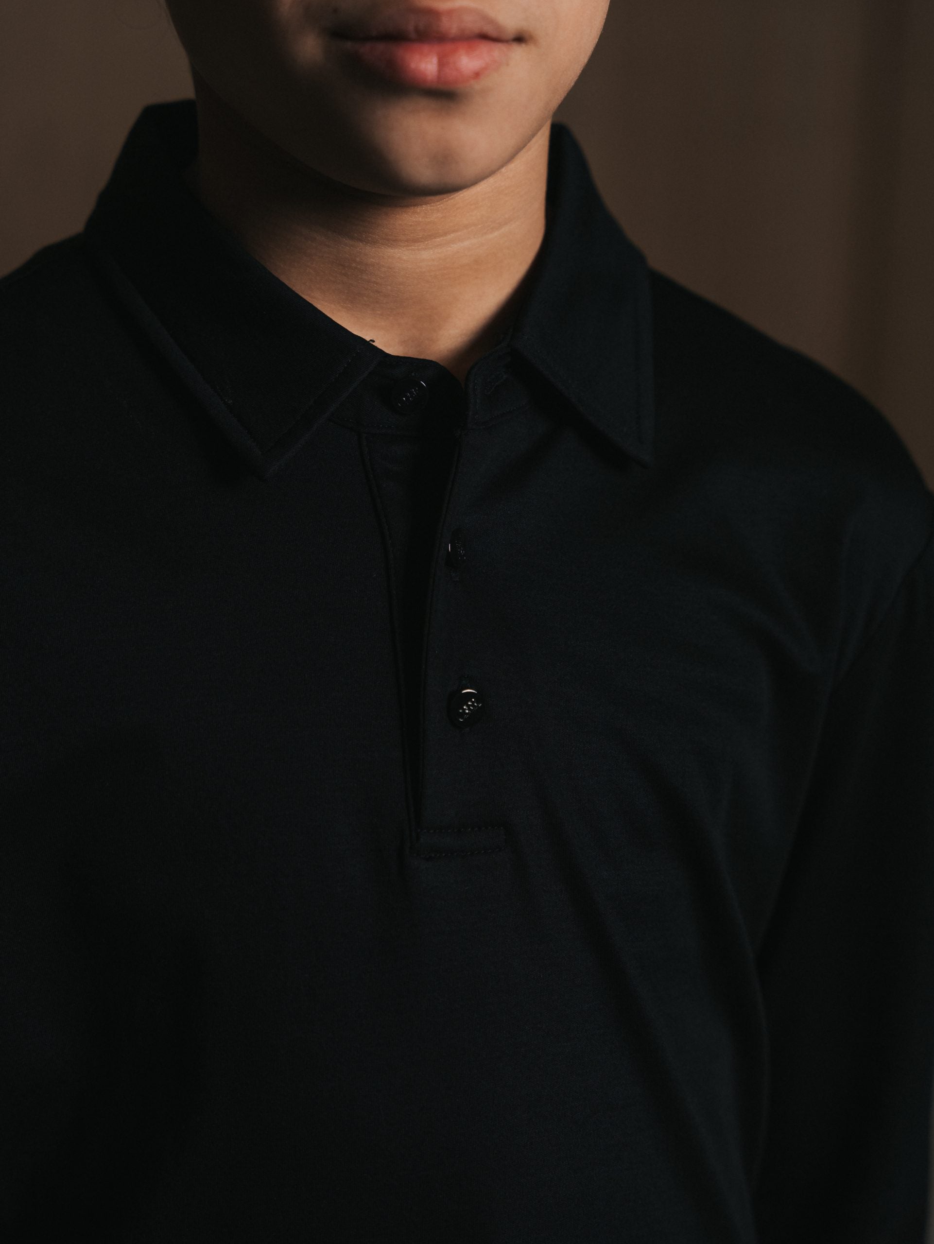 Glans polo met lange mouwen