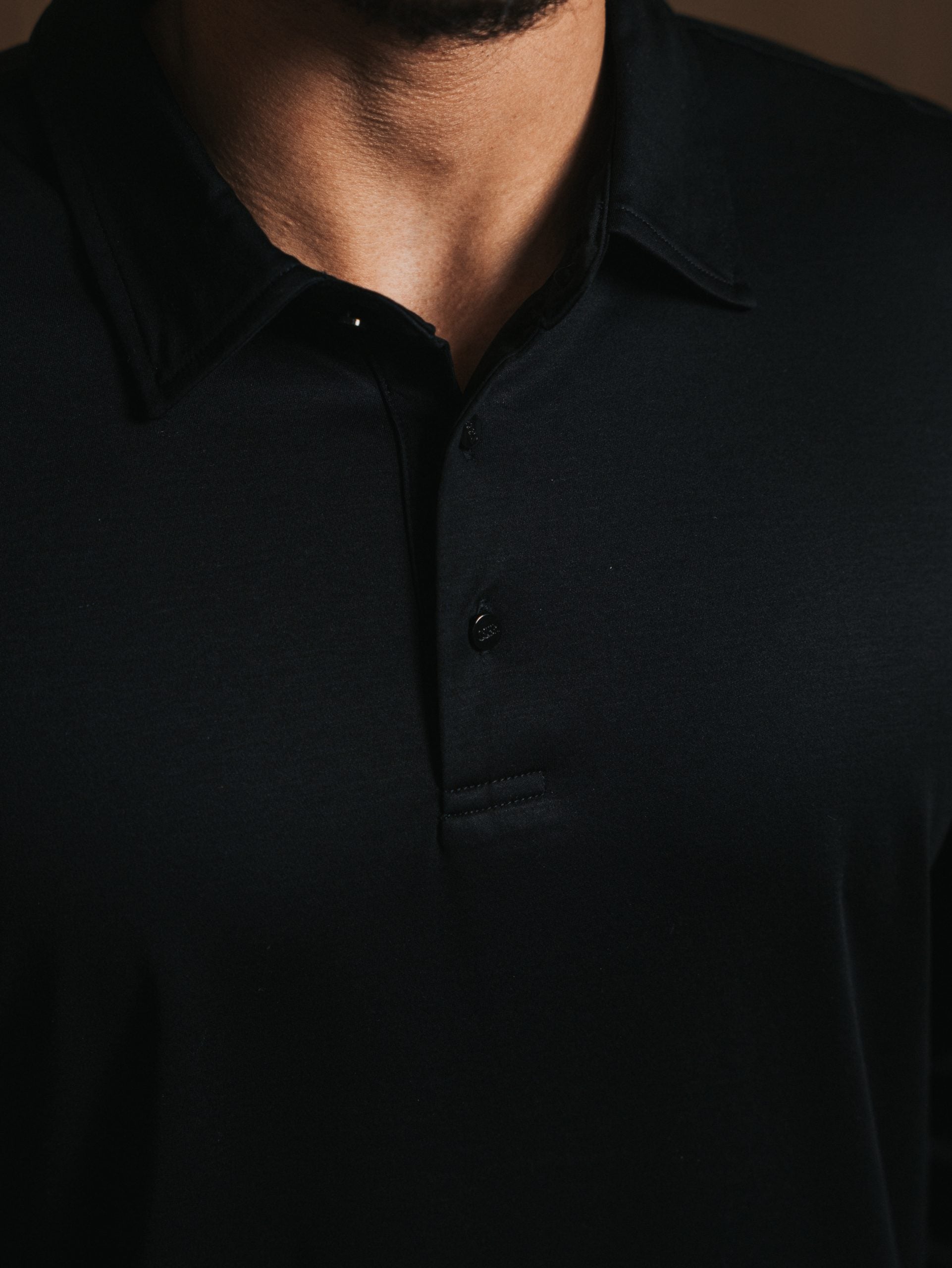 Glans polo met lange mouwen