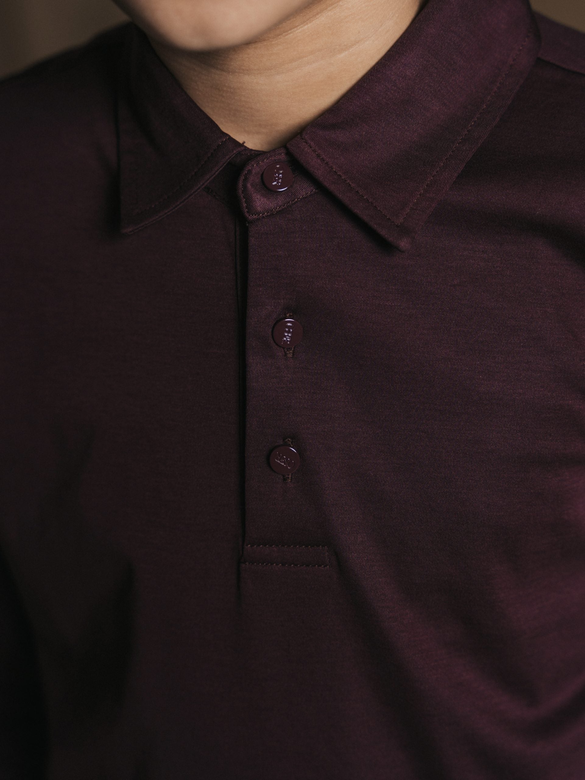 Glans polo met lange mouwen
