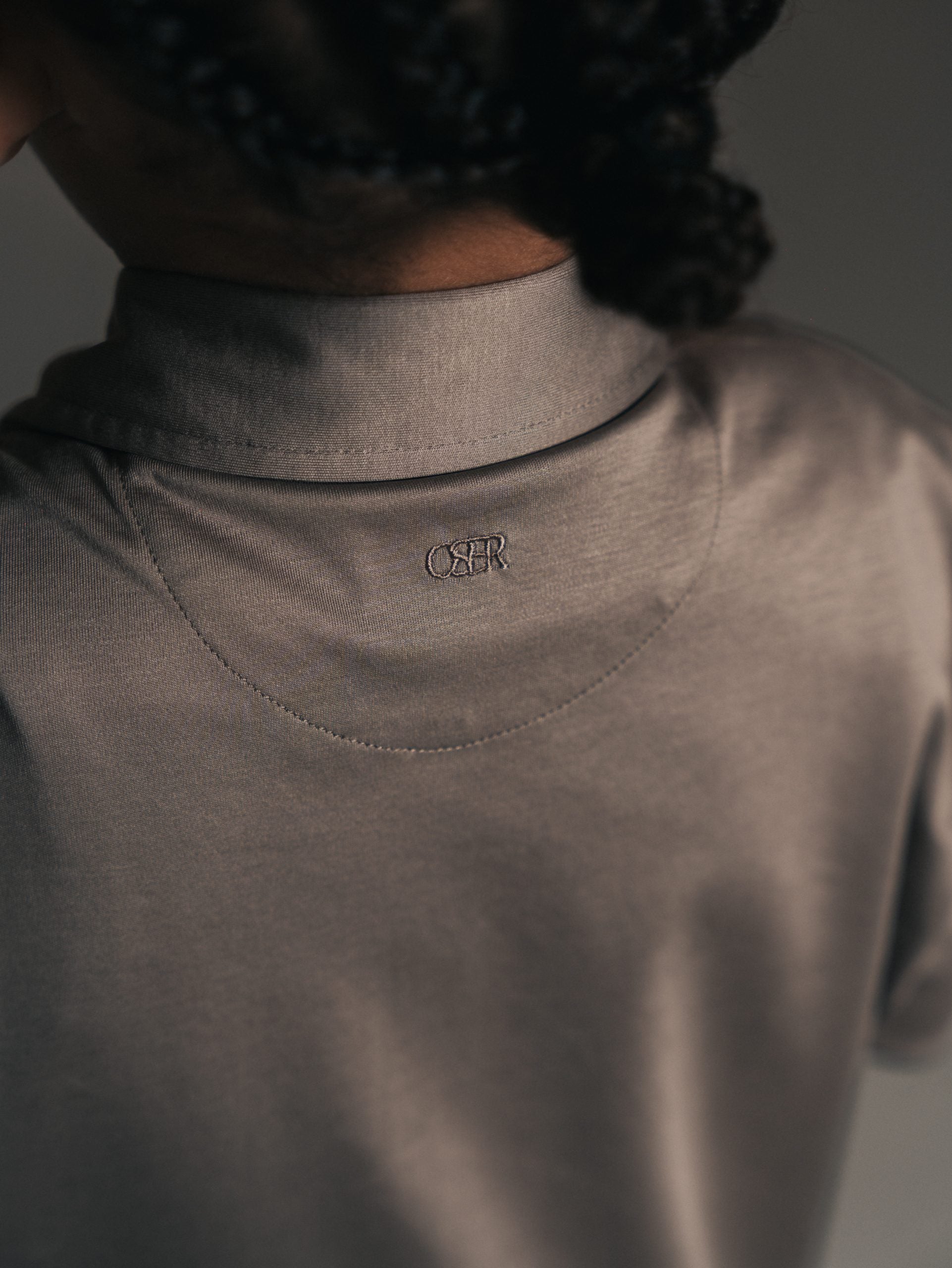 Glans polo met lange mouwen