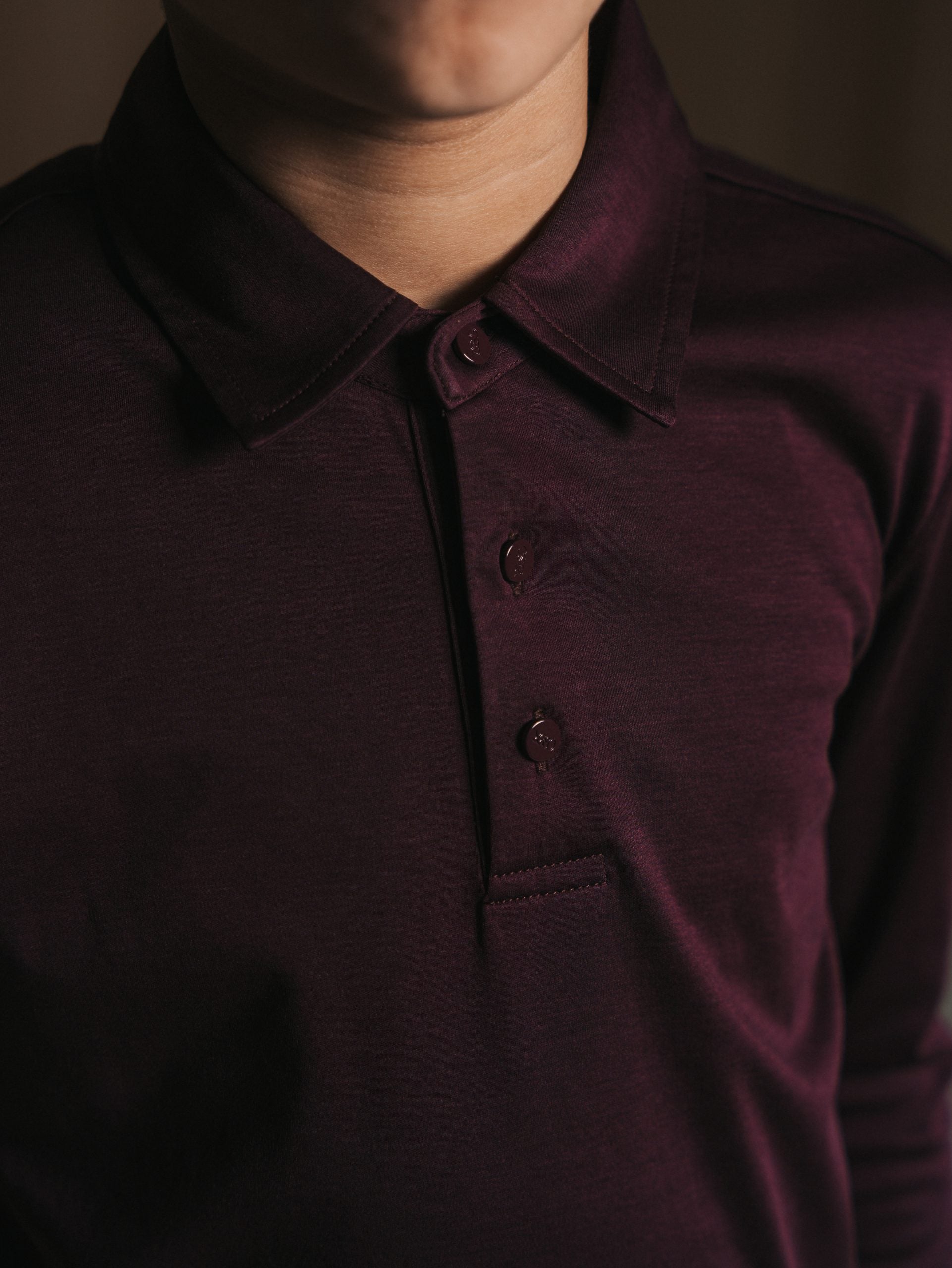 Glans polo met lange mouwen